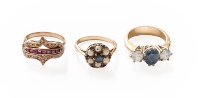 Lot 305 - A Synthetic Sapphire and Cubic Zirconia Three...