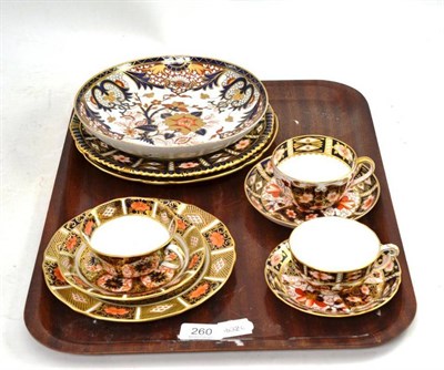 Lot 260 - A Royal Crown Derby Imari trio, two cups and saucers, two plates and a dish