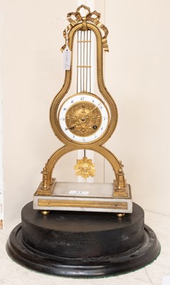 Lot 51 - A French Gilt Metal Striking Mantel Clock,...