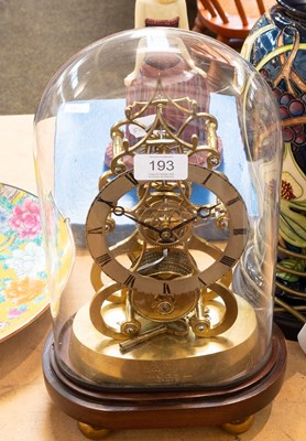 Lot 193 - A Brass Skeleton Mantel Timepiece, clock base...
