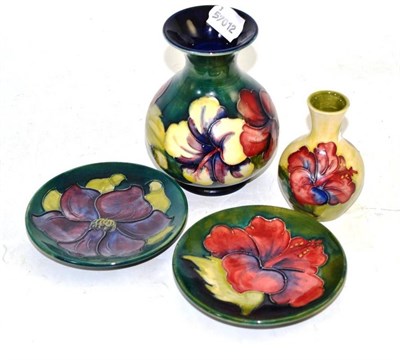 Lot 272 - Four Moorcroft Hibiscus and Clematis vases and dishes