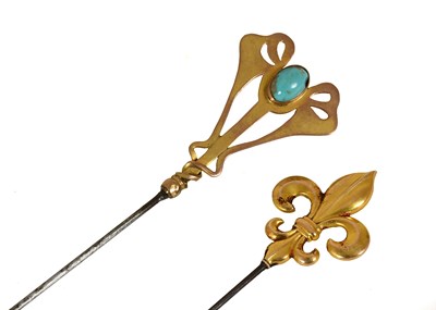 Lot A 15ct Gold Fleur De Lys Hat Pin on a steel...