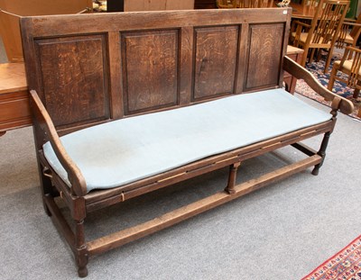 Lot 1325 - An 18th Century Oak Four Panel Settle, with...