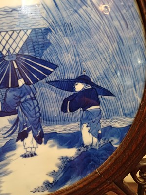 Lot 22 - A Chinese Porcelain-Mounted Hardwood Table...