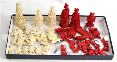 Lot 307 - A Chinese export carved ivory chess set, Cantonese, one side stained red the other left natural and