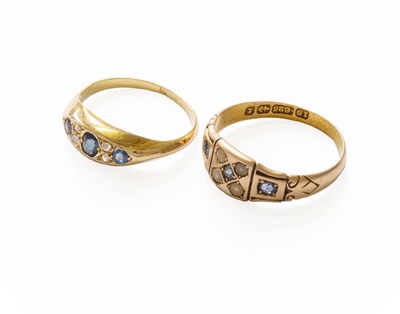 Lot 322 - A Sapphire and Diamond Seven Stone Ring, three...
