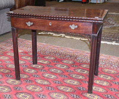 Lot 1442 - A George III Mahogany Fold Over Tea Table, the...