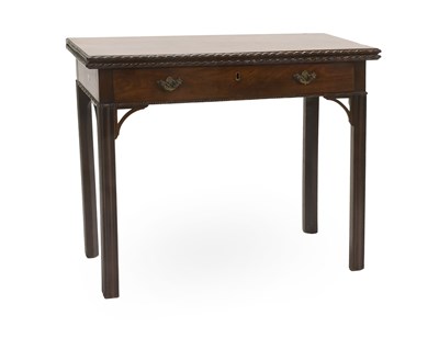 Lot 624 - A George III Mahogany Fold Over Tea Table, the...
