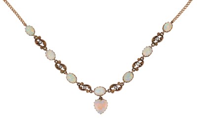 Lot 2022 - An Opal and Diamond Necklace seven oval...