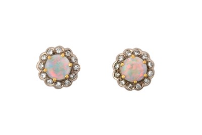 Lot 2394 - A Pair of Opal and Diamond Earrings the round...