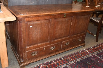 Lot 1456 - A Late George III Oak Chest, with hinged lid...