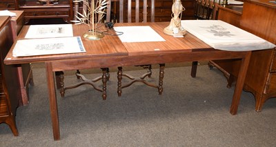 Lot 1414 - Beith of Scotland: A Teak Extending Dining...
