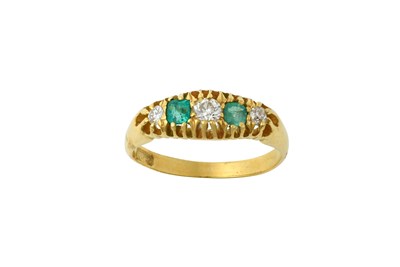 Lot 2433 - An Emerald and Diamond Five Stone Ring two...