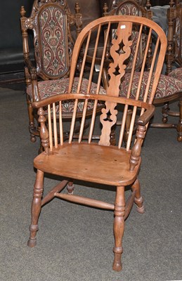 Lot 1433 - A 19th Century Ash and Elm Double Spindle Back...