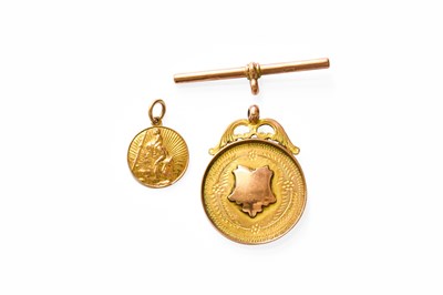 Lot 341 - A 9 Carat Gold Medallion, engraved to the...