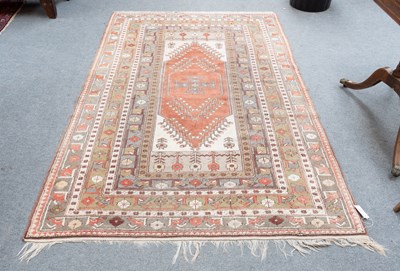 Lot 1121 - Melas Rug, the stepped strawberry field framed...