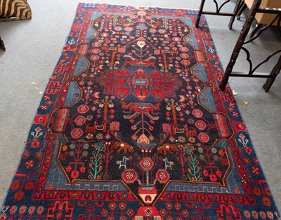 Lot 1123 - Hamadan Rug, the charcoal field of flowerheads,...