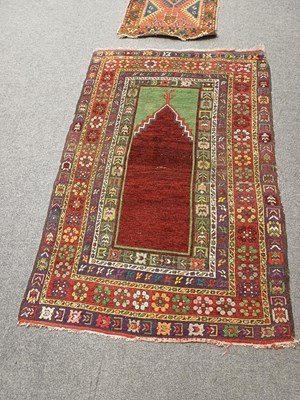 Lot 1301 - Anatolian Prayer Rug, the shaded raspberry...
