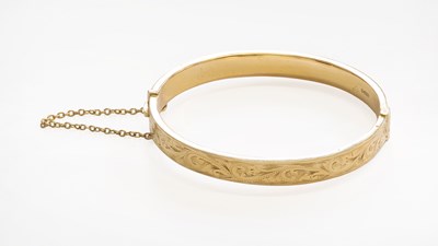 Lot 335 - A 9 Carat Gold Hinged Bangle, inner...