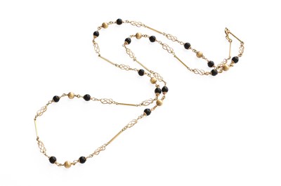 Lot 354 - A 9 Carat Gold Bead Necklace, black beads...