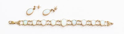 Lot 338 - A 9 Carat Gold Synthetic Opal Bracelet, nine...