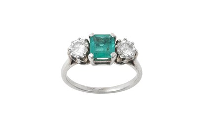 Lot 2309 - An Emerald and Diamond Three Stone Ring the...