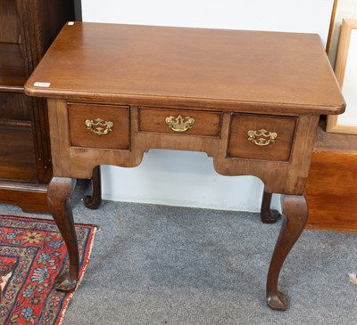 Lot 1295 - An 18th Century Oak Lowboy, on cabriole legs,...
