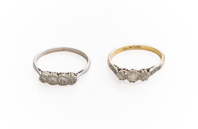 Lot 334 - A Diamond Three Stone Ring, the graduated old...