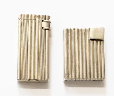 Lot 376 - A Cartier and Boucheron Lighters, underside of...