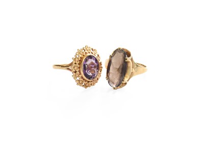 Lot 353 - A 9 Carat Gold Smoky Quartz Ring, finger size...