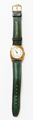 Lot 373 - A 9 Carat Gold Cushion Shaped Garrard Wristwatch