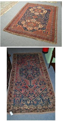 Lot 425 - Afshar Rug, South East Persia, the indigo field with two medallions enclosed by terracotta...