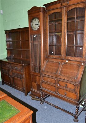 Lot 430 - A reproduction oak dresser and rack, an oak bureau bookcase on barley twist supports and an oak...