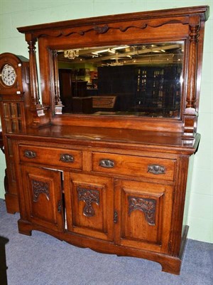 Lot 431 - A late 19th century carved oak mirror back sideboard