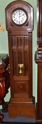 Lot 432 - A circa 1940s oak cased wall longcase clock