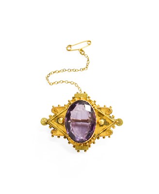 Lot 363 - A Victorian Amethyst Brooch, the oval cut...