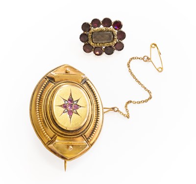 Lot 325 - A Victorian Ruby and Seed Pearl Mourning...