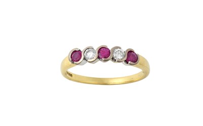 Lot 2268 - An 18 Carat Gold Ruby and Diamond Five Stone...
