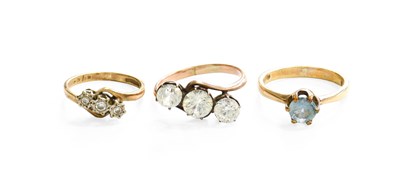 Lot 360 - A 9 Carat Gold Diamond Three Stone Ring,...