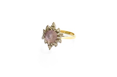 Lot 315 - An Amethyst and Diamond Cluster Ring, the...