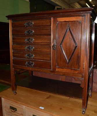 Lot 442 - An Edwardian mahogany music cabinet