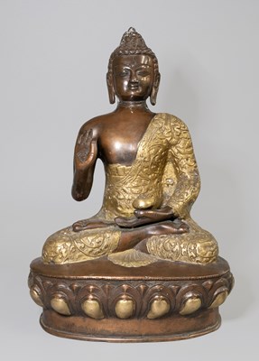 Lot 344 - A Parcel-Gilt Bronze Tibetan Style Statue of...