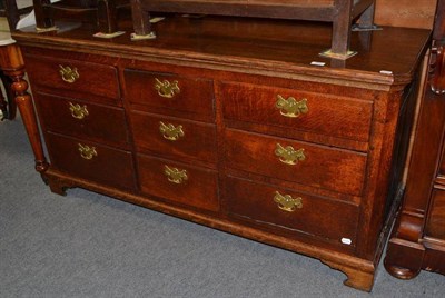 Lot 460 - A Georgian oak sideboard base with six drawers