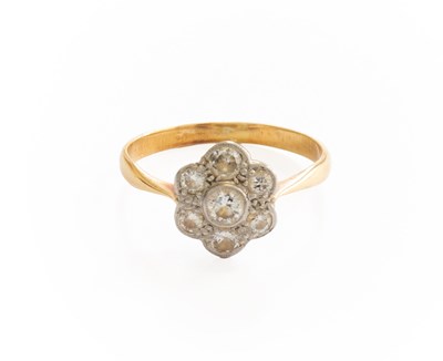 Lot 358 - A Diamond Cluster Ring, the central raised...