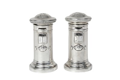 Lot A Pair of Victorian Novelty Silver and Enamel Pepperettes