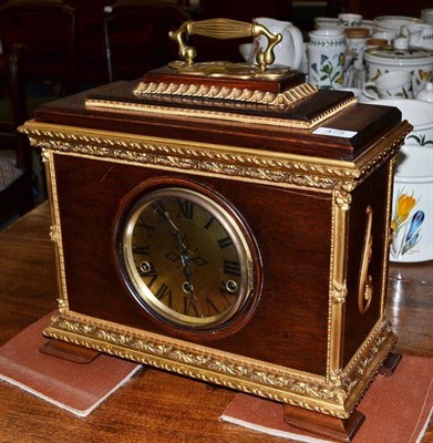 Lot 475 - A gilt metal mounted chiming mantel clock