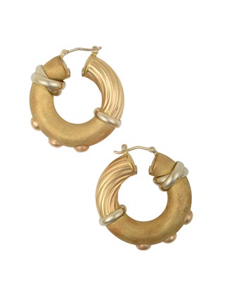 Lot 2244 - A Pair of Hoop Earrings of matte, textured and...