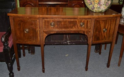 Lot 477 - An early 20th century mahogany bow front sideboard