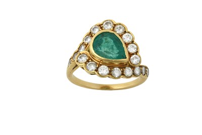 Lot 2263 - An Emerald and Diamond Ring the pear cut...