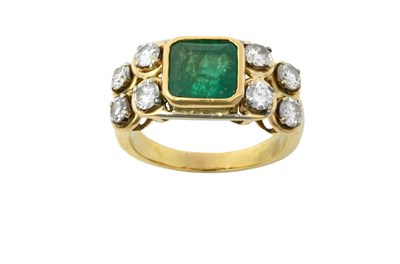 Lot 2258 - An Emerald and Diamond Ring the emerald-cut...